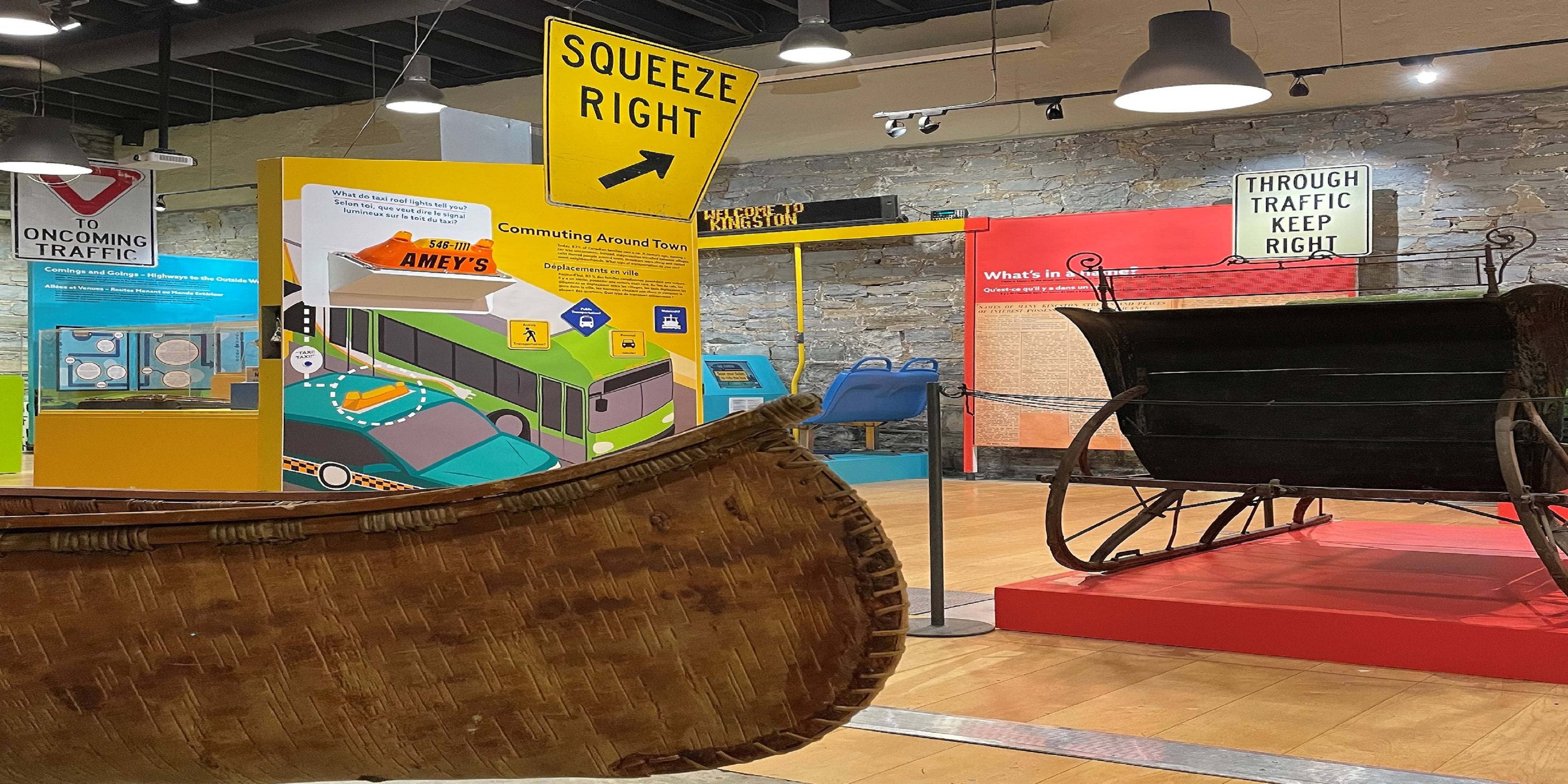 On The Move artifacts including a canoe and information panels